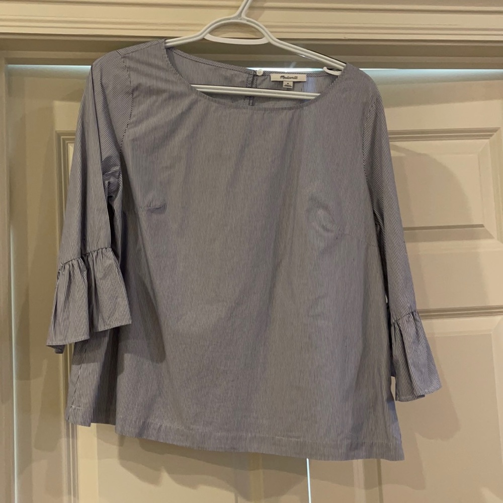 Navy and white pinstripe shirt with ruffle sleeve